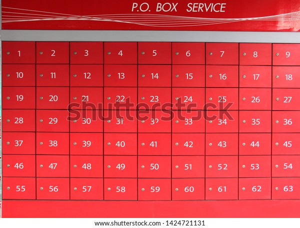 Red deposit box with number\
Divided into channels ,the post  Office (PO box service) red mail\
box.
