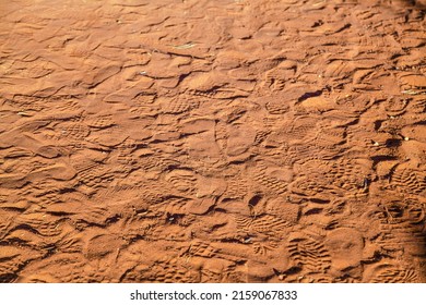 A Red Desert Sand With Footprints, Northern Territory, Australia