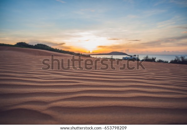 The Red Desert in Vietnam at dawn. Looks like cold\
desert on Mars.