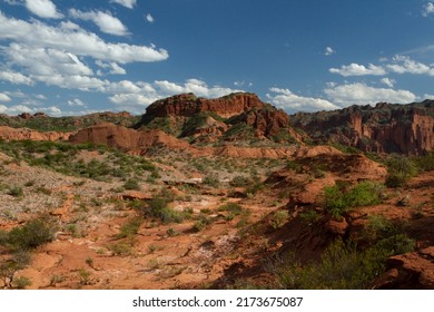 The red desert. View of the canyon, sandstone and rocky mountains under a blue sky. 