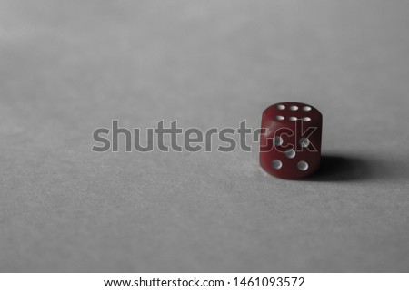 Red dice on white paper background, picture for background, for disign or presintation.