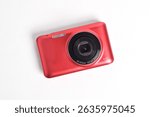 Red Digital Camera isolated on white background. Compact digital camera