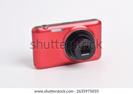Red Digital Camera isolated on white background. Compact digital camera