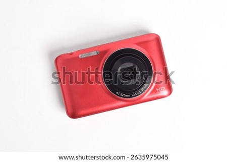 Red Digital Camera isolated on white background. Compact digital camera
