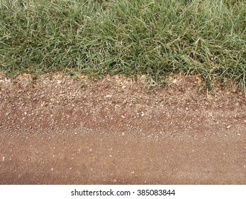 Red Dirt Road With Grass