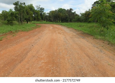 Red Dirt Road Winding On Mountain