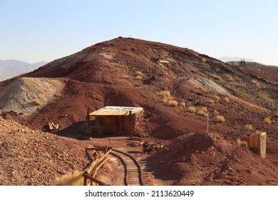 Red Dirt, Train Track and Shack at Calico Ghost Town - Former Mining Town, California