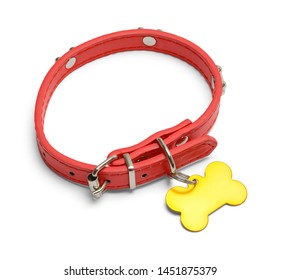 Red Dog Collar With Gold Dog Tag Isolated On White.