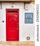 Red door in old town of Valletta, Malta