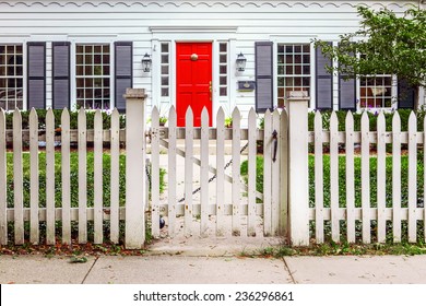 Red Door and a White Picket Fence