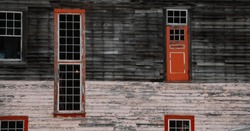 Red Door And Red Windows And Red Door On Old  Wooden Slat Rustic House Or Cabin Retro Grunge Or Grungy Background Wallpaper Doors And Windows Shapes And Patterns Red Black And Grey Horizontal Format 