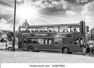 The red double decker bus.