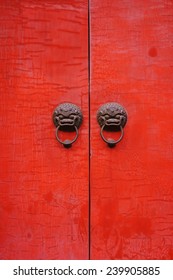 Red Double Doors With Chinese Metal Door Knockers 