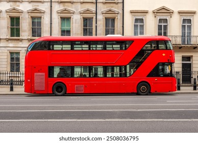 Red double-decker bus on streets of London, UK - Powered by Shutterstock