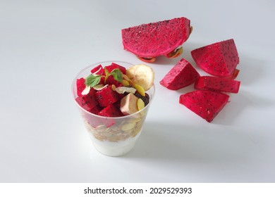 Red Dragon Fruit Mixed Yogurt With Grain Wheat Healthy Breakfast. Fresh Fruity Yoghurt Dessert Isolated Onwhite Background 