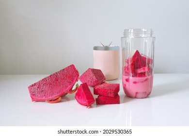 Red Dragon Fruit Mixed Yogurt Healthy Breakfast. Fresh Fruity Yoghurt Ice Blended With Hand Ice Blender Machine Isolated Onwhite Background 