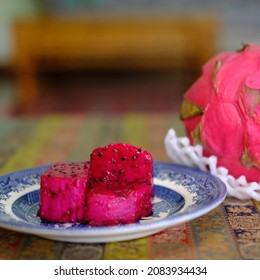 Red Dragonfruit On Plate Closeup