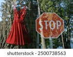 Red dress and stop sign, double exposure, May 5, 2024, National Day of Awareness for Missing and Murdered Indigenous Women and Girls (Canada).