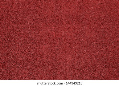 Red Dry Grungy Clay Tennis Background Texture.