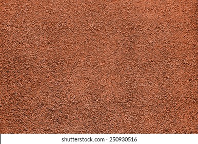 Red Dry Grungy Clay Tennis Background Texture. 