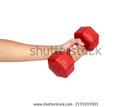 red dumbbell holds in the hand on the white background