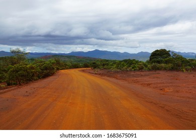 Red Dusty Road Leading To The Old Prony Village In New Caledonia