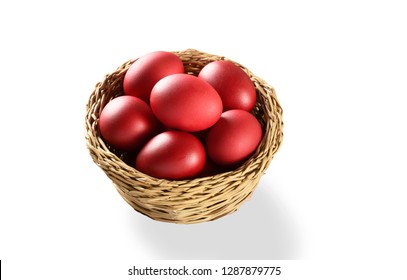 Red Easter Eggs In Basket Isolated