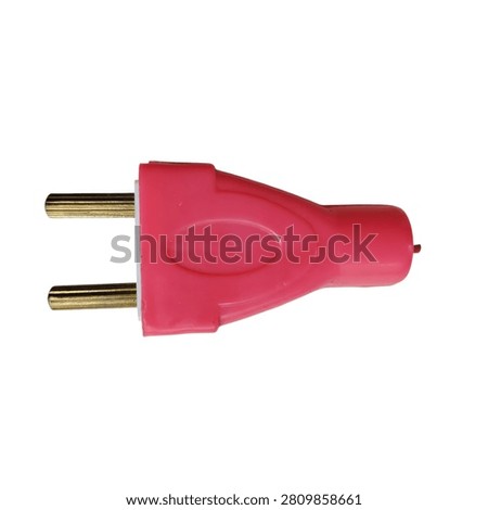 Red electrical plug adapter with two prongs isolated on white background