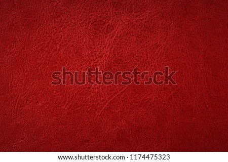 Red elegance leather texture for background with visible details 

