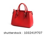 Red elegant female bag with two handles on white background isolated