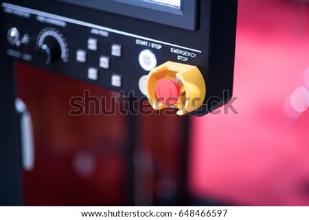 Red emergency stop switch reset button