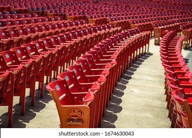 Red, Empty Stadium Chairs. Empty Seats In A Stadium. The New Normal.