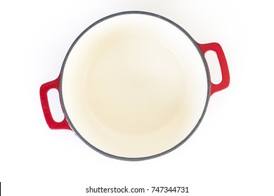 Red Enameled Cast Iron Covered Dutch Oven On A White Background.