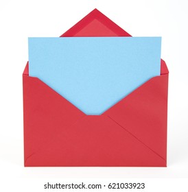 Red envelope with blank blue note card. Isolated.