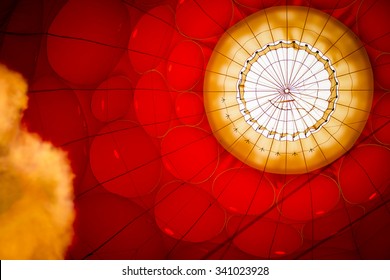 Red Envelope Of The Hot Air Balloon With A Fire From A Burner