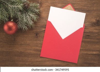 Red envelope on christmas holiday background 
 - Powered by Shutterstock