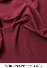 Red Fabric Background. Woven Fabric. Red Background.