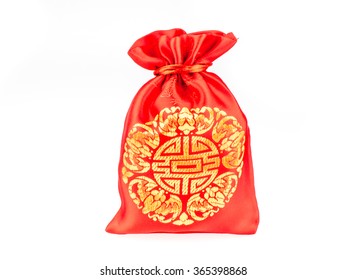 Red Fabric Bag Or Ang Pow With Chinese Style Pattern On Grey Background