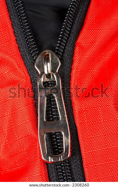 Red fabric and a chrome\
zipper opened