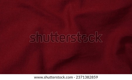 red fabric texture background with waves