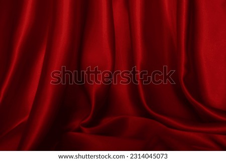 red fabric texture empty as waves (spot focus)