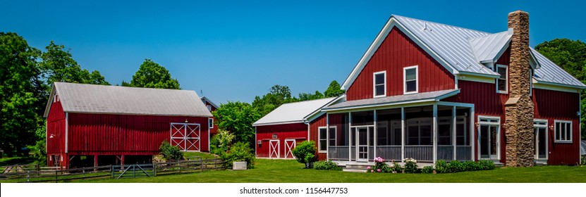 A Red Farmhouse And Barn In Rhinebeck, New York