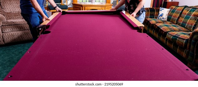 Red Felt Pool Table Is In The Process Of Disassembly