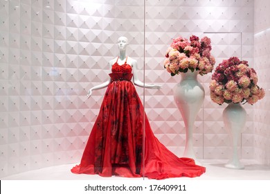 red female dress on mannequin 
