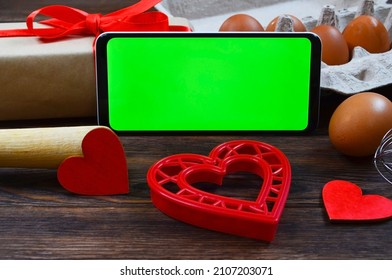 Red Festive Ingrediens For Cooking, Valentines Day Eggs, Rolling Pin And Whisk, Cutter Dish Shape Heart For Baking Cake Flat Lay, Chroma Key Smart Phone Copy Space.