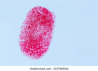 Red Fingerprint On White Paper