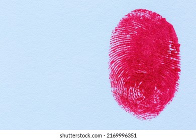 Red Fingerprint On White Paper