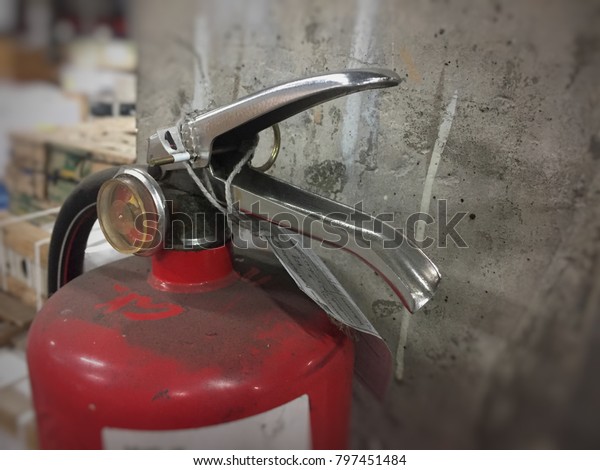 Red fire\
extinguishers used for\
factories.