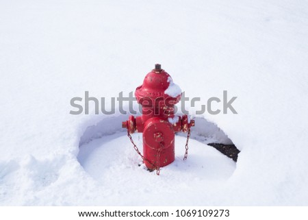 Red fire hydrant on the street. Fire hydrant, fireplug, fire pump, connection point by which firefighters can tap into a water supply.