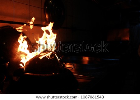 red fire in the restaurant kitchen 